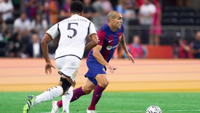 Oriol Romeu saat menghadapi Real Madrid di laga pramusim