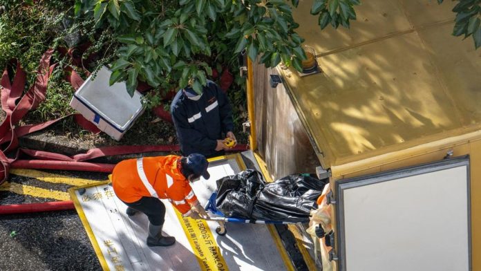 FOTO: Korban Tewas Kebakaran Apartemen Hong Kong Tembus 128 Orang